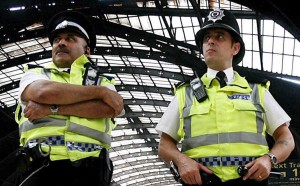 Two British police officers on special duties  at Paddington Station west London, 2 July 2007. EPA/ANDY RAIN
