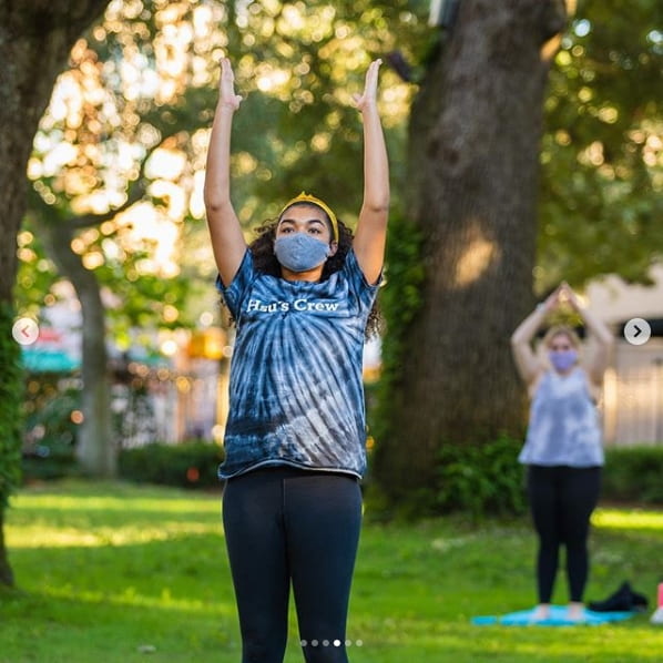Student participating in Friday yoga at the Cistern.