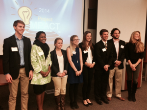 The eight finalists at the Project IMPACT event. Photo courtesy of the School of Business Blog. 