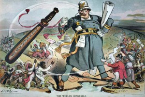 A cartoon from 1905 shows U.S. President Theodore Roosevelt using his “New Diplomacy”—characterized by the phrase “speak softly and carry a big stick”—to police the world. Image obtained from Britannia.com